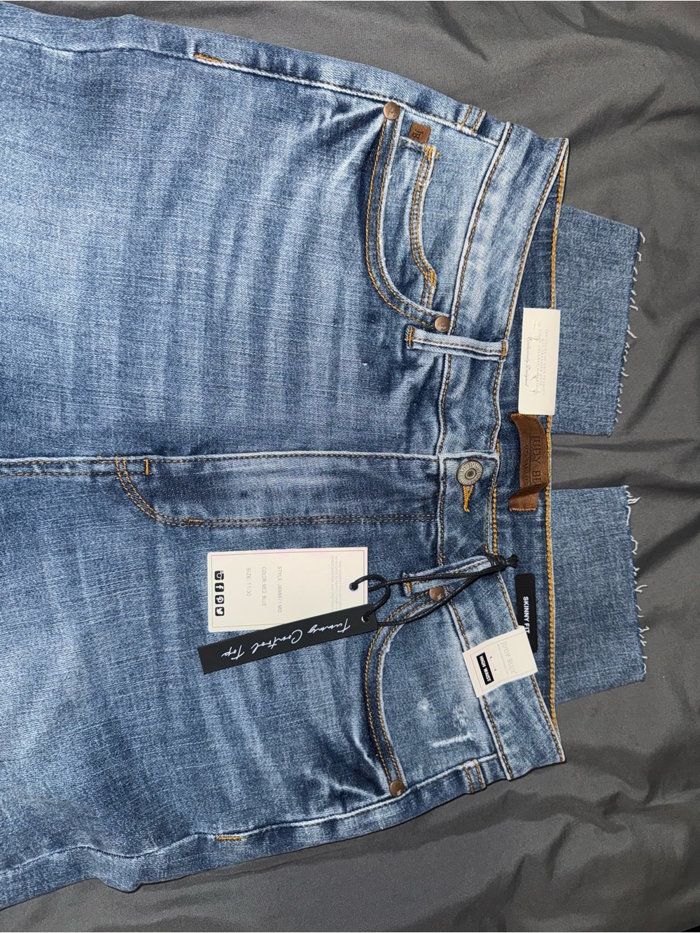 Judy Blue Light Blue Distressed Denim Shorts with Raw Hem